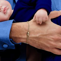 Get your man something personal and stylish for a special occasion. Introducing our exquisite Custom Silver Bracelet with Kids' Names, a heartfelt gift that Dad will cherish forever. Handcrafted with love, this bracelet serves as a beautiful reminder of the special bond between father and children. Each side is meticulously engraved with the names of your little ones, creating a personalized piece that captures their unique personalities. The sleek, versatile design ensures that Dad can wear thi Father's Day Gold Name Bracelet Gift, Personalized Gold Name Bracelet For Father's Day, Silver Custom Name Bracelet For Father's Day, Personalized Gold Name Necklace For Father's Day, Father's Day Stainless Steel Jubilee Name Bracelet, Dad With Kids, Family Bracelet, Family Bracelets, Gold Chain Bracelet