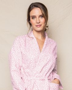 Like joyful confetti, the little pink hearts dance across the fabric as if batting their eyelashes. This elegant robe is the perfect addition to our collection. The classic, fun print is a staple and will have you looking smart in no time. The fabric is made from 100% of the finest quality cotton. It is yarn-dyed to prevent fade and brushed for added softness making the sleepwear feel absolutely luxurious, getting cozier after each wash. You will be tucked in luxury and off to dreamland. Bonne n Pink Long Sleeve Sleepwear With Heart Print, Fitted Pink Printed Sleepwear, Fitted Spring Robe For Loungewear, Fitted Robe For Spring Loungewear, Fitted Spring Daywear Robe, Fitted Robe For Spring Daywear, Spring Floral Print Pink Sleepwear, Spring Cotton Robe For Bedtime, Spring Pink Floral Print Sleepwear