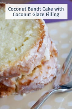 a close up of a piece of cake on a plate with a fork and spoon