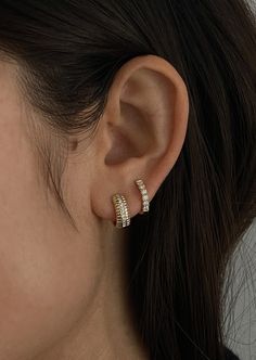 The pavé setting originates from the French word “to pave”—each earring is paved with six diamonds, adding a little extra to your every day stack. If you're looking for something thinner, shop our Pavé Hoop Huggie Earrings.Complete the look with the Petite Hoop Huggie Earrings. Featuring six round diamonds on each earring.Secure snap hinge closure. 14k solid gold—alwaysWeight: Approx 1.1g per earringWidth: 2.3mmCarat weight: 0.24cw per earringClarity: SI 1-2 Diamond Huggie Earrings, Fall Rings, French Word, Gold Baroque, Figaro Chain Necklace, Earrings Diamond, Gold Heart Necklace, Pearl Hoop Earrings, Diamond Charm