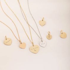 "14K 18K Solid Custom Engraved Heart Necklace, Personalized Dainty Gold Pendant, 2 Side Personalized Date Name Heart Pendant Gift for Her/Him ► Adding a customized tiny bar at clasp may be a good idea: https://etsy.me/3cn9OQ5 Material: Solid Gold (real gold, no gold-filled or no gold plated material) Karat: 14K (585), 18K (750) Available Gold Colors: Yellow, rose and white Available chain thickness: 0.84mm, 0.95mm Available Heart pendant size (width): 10mm, 12mm, 14mm The pendant can be engraved  2 sided upon request.  You can customize the chain length from 14\" to 20\". The \"cable chain\" is used for this necklace. You can write for longer and different chain options. Chain Length - 14 inches (choker) Chain Length - 16 inches adjustable 15 inches (choker) Chain Length - 18 inches adjust 14k Gold Engraved Double Heart Jewelry, Engraved 14k Gold Double Heart Jewelry, Gold Engraved Heart Pendant Necklace, Engraved Yellow Gold Heart Jewelry, Elegant Engraved Charms For Mother's Day, Engraved Double Heart Yellow Gold Jewelry, Engraved Heart Shaped Yellow Gold Jewelry, Engraved Heart-shaped Yellow Gold Jewelry, 14k Gold Heart Charm Necklace In Silver