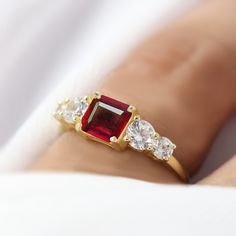 Wedding ring, Octagon ruby Engagement ring, July birthstone, AAA Ruby ring, Statement ring, ring for women, octagon ruby jewelry, Gold ring, Natural red rose ruby ring. *Other Similar Jewelry Available Here* https://www.etsy.com/shop/AreebaJewelry Details:- Gemstone - Ruby Stone Color Available - Natural Red Stone Setting - Prong Birthstone - July birthstone Quality - AAA Grade Stone Size - 5  MM Rize Size - 5 US TO 9 US Available Type - 100% Natural  Shipping service - Free worldwide shipping s Asscher Cut Birthstone Rings In Fine Jewelry, Red Cubic Zirconia Birthstone Jewelry, Promise Ruby Diamond Ring With Prong Setting, Asscher Cut Gemstone Promise Ring, Classic Promise Jewelry With Lab-created Ruby, Red Ring With Center Stone, Classic Lab-created Ruby Jewelry For Promise, Red Diamond Princess Cut Ring, Anniversary Cluster Ruby Ring With Prong Setting