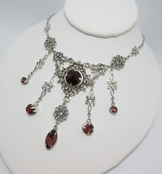 "This is a new handmade necklace. It is made with antiqued silver plated filigrees, accented with high quality AMETHYST PURPLE glass jewels/rhinestones that sparkle like crystals. Decorated portion is 6 1/2\" wide and 3 1/4\" tall in the center. Necklace is adjustable 15-18\" with a lobster clasp and chain extender. If you would like a different length, please send us a message. Matching earrings and headpiece are listed in our store." Medieval Steampunk, Goth Things, Steampunk Goth, Purple Gothic, Antique Silver Necklace, Choker Pendant, Chain Extenders, Crystal Ab, Amethyst Purple