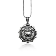 Viking Shield with Drekar Necklace, Norse Mythology Shield Pendant with Viking Dragon, Nordic Necklace in Silver, Scandinavian Jewelry These 925K Sterling Silver Viking Shield with Drekar Necklace has special handmade engraving details which photos are taken with original products. It's very elegant and classy for everyday use and gives stylish look to your outfits. Also, can be preferred as a gift for friends and family for an eternal memorial. Dream collection has many meanings behind its back Symbolic Silver Tarnish Resistant Medallion Necklace, Symbolic Silver Medallion Necklace, Symbolic Silver Medallion Necklace Tarnish Resistant, Symbolic Silver Tarnish-resistant Medallion Necklace, Viking Style Sterling Silver Round Pendant Jewelry, Viking Style Engraved Round Pendant Necklace, Viking Style Silver Round Pendant Necklace, Viking Style Engraved Sterling Silver Necklace, Viking Style Silver Pendant Necklace