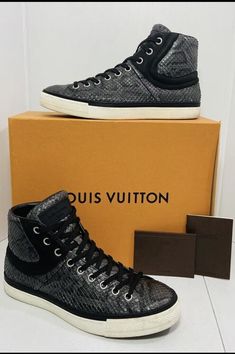 Elevate your sneaker game with these high-top Louis Vuitton Python sneakers. The black sneakers feature the iconic LV signature on the side and a durable rubber outsole for maximum comfort and style. Lace-up closure ensures a secure fit for any occasion - whether you're hitting the gym, running errands, or dressing up for work. These authentic LV sneaker boots are a rare find, and the perfect addition to any sneakerhead's collection. With a size 8 US shoe size, these sneakers are designed for men and are suitable for summer and spring wear. Don't miss your chance to own these limited edition Louis Vuitton Python sneakers. Pre owned in Great Used Condition The best way to describe my item is with my pictures please look at all my photos to find out more details Please let me know if you hav Limited Edition Louis Vuitton, Lv Sneakers, Louis Vuitton Limited Edition, Spring Wear, Sneaker Games, Black Sneakers, Black Sneaker, Authentic Louis Vuitton, Sneaker Head