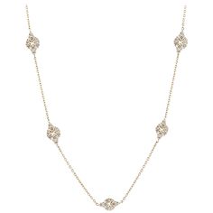 18K yellow gold chain style necklace with diamond stations. The stations are in a diamond shape with each station containing eight round diamonds. The 168 round diamonds total 5.90 carats, G-H color and VS1-VS2 clarity. The necklace measures 43 inches in length. Marked "750" on the clasp. Chain With Diamonds, Gold Long Chain, Diamond Chain Necklace, Necklace With Diamond, Hamsa Pendant, 18k Gold Chain, Long Chain Necklace, White Gold Necklaces, Diamond Chain