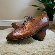 Men's Handmade crocodile textured leather lace up oxford shoes, leather sole shoes, formal office wedding classic dress leather shoes men Crafted from premium genuine leather, our boots combine luxury with durability, tailored for your perfect fit. Whether you're dressing for a special occasion or everyday wear, we have the ideal pair for you. Order your custom-made genuine leather boots today and make a stylish statement! **Shipping Information - International shipping available via DHL or FedEx Express. - Estimated delivery time: 5-7 business days. - Possible customs delays. - Import duties and taxes are the buyer's responsibility. - Orders are shipped from Pakistan if local stock is not available. - No shipping on weekends. **Terms & Conditions - Contact us for any product-related issue Business Dress Shoes With Crocodile Pattern And Round Toe, Formal Cap Toe Dress Shoes With Crocodile Pattern, Office Dress Shoes With Crocodile Pattern And Plain Toe, Plain Toe Dress Shoes With Crocodile Pattern For Office, Office Dress Shoes With Crocodile Pattern, Wingtip Dress Shoes With Crocodile Pattern, Formal Crocodile Pattern Cap Toe Dress Shoes, Fitted Wingtip Dress Shoes With Crocodile Pattern, Luxury Business Oxfords With Textured Sole