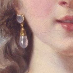 a painting of a woman's face with large earrings