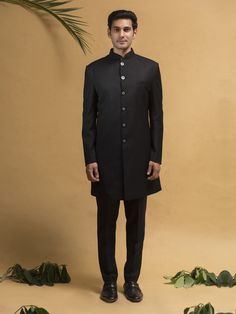 Black Colour Designer indowestern for groom,Family & firends made from the finest italian  fabric will make you feel like a king on the happiest & most important day of your life.you can customize it according to your measurement as the fitting make it more beautiful to wear.Its beautifully .Mens Indowestrn,indowestern for men COST INCLUDES INDOWESTERN & TROUSERS Fitted Black Bandhgala With Naqshi Detailing, Black Fitted Bandhgala With Naqshi, Fitted Black Sherwani With Naqshi Detail, Fitted Black Sherwani With Naqshi, Traditional Black Tuxedo For Groom, Traditional Black Groom Tuxedo, Formal Black Bandhgala With Naqshi Detailing, Formal Fitted Dabka Bandhgala, Semi-formal Fitted Bandhgala With Dabka