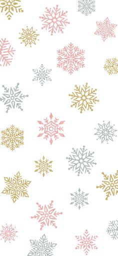 snowflakes on a white background with gold and silver glitter in the middle,