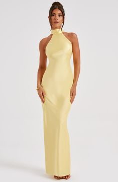 Here's to the nights you will remember because of the fits you won't forget. You will be unforgettable in Etta, our luxe maxi made from bias cut satin that skims beautifully over the body. The dress is completely backless with a high neck and an oversized tie neck detail. Elevate any look with Etta, platform heels and a sleek knot. 



Colour: Lemon.

Luxury bias cut satin.

High neckline.

Backless detail.

Skims over the figure.

Flares gently at the hem.

Maxi length.

Model is an XS and is w Elegant Dresses Yellow, Open Back Wedding Guest Dress, Yellow Satin Bridesmaid Dresses, Butter Yellow Bridesmaid Dresses, Year 12 Formal Dresses Australia, Yellow Long Dresses, Light Yellow Bridesmaid Dresses, Satin Dress Backless, High Neck Satin Dress