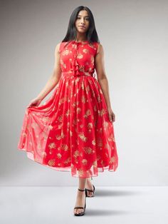 Reflect the versatility and grace of fusion fashion with our Vibrant Verve - Red Printed Chiffon Knee Length Indo Western Dress. This 'Indo western' dress, woven with premium red chiffon, flaunts an enticing print that exudes a vibrant charm. The knee length enhances the modern appeal of the attire, making it an ideal choice for both festive and casual gatherings. This dress is the hallmark of a stylish blend between cultural depth and contemporary elegance. Care instructions: Dry clean only, do Western Red Dress, Red Midi Dress For Festive Occasions, Red Maxi Dress For Spring Festivities, Red Festive Maxi Dress For Spring, Red Spring Maxi Dress For Festive Occasions, Festive Red Maxi Dress For Spring, Red Spring Festive Maxi Dress, Festive Red Midi Dress, Festive Red Midi Length Dress