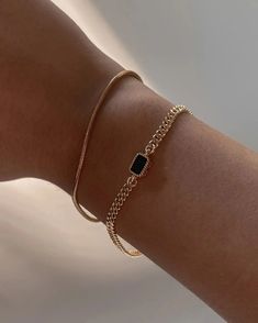 The slinkiest and daintiest bracelet that you can wear every day for that barely-there look. Featuring a 2mm width 18k gold-filled snake chain that can easily be stacked. Tarnish-resistant, showerproof, and safe for sensitive skin. ………………………………��…. D E T A I L S • Snake chain width measures 2mm• Snake chain length measures 6.5"/16.5cm• Spring clasp• Tarnish-resistant, waterproof, and safe for sensitive skin • 18K Gold Filled Gold Stone Bracelet For Women, Bracelets Gold Simple For Women, Cuban Chain Bracelet, Dainty Gold Bracelet, Gold Chain Bracelet, Snake Chain Bracelets, Classy Jewelry, Seminyak, Jewelry Lookbook