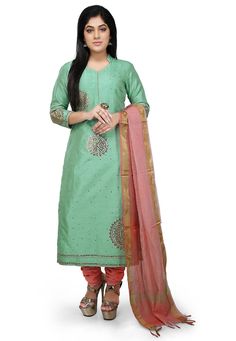 Art Bhagalpuri Silk Straight Kameez in Sea Green. This Readymade Attire with Cotton Lining is Gracefully Embroidered with Mirror and Gota Patti Work and is Crafted in Collar Neck and Quater Sleeve. Available with a Shantoon Churidar and a Kota Silk Dupatta in Peach. The Lengths of the Kameez and Bottom are 48 and 52 inches respectively.Do note: Accessories shown in the image are for presentation purposes only and length may vary upto 2 inches.(Slight variation in actual color vs. image is possib Pista Green Embroidered Slub Silk Set, Pista Green Slub Silk Churidar For Festivals, Semi-stitched Slub Silk Churidar With Dori Work, Green Embroidered Slub Silk Traditional Wear, Embroidered Green Slub Silk Traditional Wear, Embroidered Pista Green Slub Silk Salwar Kameez, Pista Green Embroidered Slub Silk Dupatta, Pista Green Slub Silk Salwar Kameez For Diwali, Pista Green Slub Silk Unstitched Suit With Zari Work