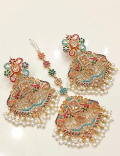 Beautiful nauratan multi stone earrings and Tikka set. Indian Jewelry Sets, Indian Earrings, Indian Jewellery, Multi Stone, Stone Earrings, Luxury Jewelry, Beautiful Earrings, Jewelry Shop, Jewelry Sets