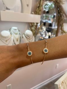 This stunning Rose Gold Evil Eye Bangle not only adds a touch of elegance to any outfit, but also serves as a symbol of protection. The eye-catching design is perfect for the fashion-forward and superstitious alike. Shine bright with this trendy and meaningful bangle. The bracelet has 316L Stainless Steel material, therefore it is tarnished resistant!! This evil eye bracelet is totally handmade. It is stainless steel which made by handmade and it is adjustable. Since it is adjustable, it is suitable for everyone. Trendy Evil Eye Jewelry, Trendy Gold Evil Eye Bracelet, Trendy Evil Eye Jewelry Gift, Adjustable Metal Evil Eye Bracelet, Rose Gold Bracelets Fashion Accessory, Trendy Bangle Jewelry As Gift, Resizable Bracelet Jewelry As Fashion Accessory, Stackable Bangle Jewelry, Resizable Bracelet Jewelry Fashion Accessory