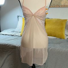 Light Pink Adjustable Straps Halter Back Fitted Sheer Sleepwear For Loungewear, Fitted Bra-friendly Loungewear, Fitted Sheer Camisole For Bedtime, Lace Underwire Sleepwear For Loungewear, Sheer Stretch Feminine Sleepwear, Feminine Sheer Stretch Sleepwear, Sheer Camisole Slip For Loungewear, Sheer Camisole For Bedtime, Sheer Stretch Sleepwear For Loungewear