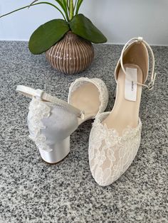 "Classic Wedding comfortable block 2 1/4\" heel shoes, front lace and satin heel adorned with a beautiful beaded with pearls edging embellishment, please look at the pictures. available in sizes: 5M to Please look at all the pictures! contact for additional questions, or concerns. NO RETURNS NO EXCHANGES, FINAL SALE, PLEASE CONTACT FOR ANY QUESTIONS CONCERNS." Lace Wedding Shoes With Round Toe, Elegant Low Heel Wedding Shoes With Lace Trim, Wedding Shoes With Lace Work, Lace Heels With Lace Trim For Wedding, Lace Wedding Shoes With Lace Work, Lace Wedding Shoes With Round Toe For Ceremony, Closed Toe Lace Wedding Shoes With White Laces, Wedding Shoes With Lace Trim And Closed Toe, Lace Wedding Shoes With White Laces, Closed Toe