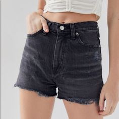 Exclusive High-Rise Denim Short-Short In Our Signature Girlfriend Fit By Bdg From Uo. In Soft Stretch Denim With A Relaxed-Slim Fit Built With 5 Pockets + Zipper Fly. Complete With A Raw-Edge, Frayed Hem. Smoke Free Pet Friendly. New With Tags. - 99% Cotton, 1% Spandex - Machine Wash - Model Is 5’9” And Wearing Size 26 Grunge Jean Shorts With Built-in Shorts, Edgy Jean Shorts With Built-in Shorts, Washed Black Bottoms With Built-in Shorts, Relaxed Fit High-waisted Black Shorts, Washed Black Cotton Jean Shorts, Grunge High Waist Jean Shorts With Built-in Shorts, Trendy High-waisted Shorts By Urban Outfitters, Urban Outfitters Fitted Cotton Shorts, Fitted Cotton Shorts By Urban Outfitters