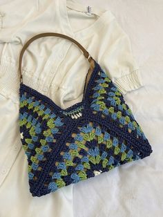 This Boho Style Woven Straw Shoulder Bag is the perfect accessory for teen girls, college girls, and beach vacations. With a large capacity, it can hold all your essentials while adding a touch of boho chic to your look. The woven straw material gives it a unique texture, making it a standout piece in your collection. Stay on-trend and stay organized with this must-have tote. Color : Blue Bag Size : Medium Type : Straw Bag Pattern Type : Colorblock, Tribal Material : Straw Size Bag Height Bag Le Trendy Square Shoulder Bag For Vacation, Vacation Cotton Shoulder Bag With Adjustable Strap, Trendy Crochet Tote Bag For Beach Season, Trendy Large Capacity Crochet Bag For Beach Season, Trendy Square Shoulder Bag For Beach, Trendy Square Shoulder Bag For The Beach, Trendy Handmade Vacation Shoulder Bag, Trendy Cotton Beach Bag For Vacation, Trendy Handmade Shoulder Bag For Vacation