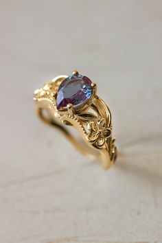 Alexandrite engagement ring, art nouveau ring / Eloise | Eden Garden Jewelry™ Engagement Ring Flower, Art Nouveau Engagement Ring, Gold Color Combination, Reddish Purple, Art Nouveau Ring, Flower Engagement Ring, Alexandrite Engagement Ring, Alexandrite Ring, Romantic Design