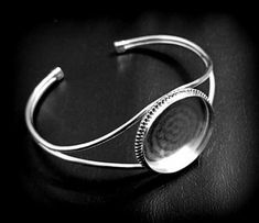 Product Details :- 925 Sterling Silver Bangle Bezel Setting Cup Back Side :- Close Shape - Round Material :- Only Pure 925 Sterling Silver Shipping :- * More then 35$ order value goods automatically converted into free shipping for US buyers only, * Delivery by normal courier will take 15-25 days * If any buyer need items more fast, Then message me for EXPRESS DELIVERY. Handmade Round White Gold Bangle, Adjustable Sterling Silver Round Bangle, Classic Nickel-free Round Bangle, Sterling Silver Cabochon Bracelet As A Gift, Silver Cabochon Cuff Bracelet Gift, Adjustable White Gold Bangle, Adjustable Bezel Set Bracelets As A Gift, Adjustable Bracelets With Bezel Setting As Gift, Nickel-free Silver Cuff Bracelet