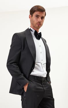 DETAILS If you find your evening event calendar filling up fast, it might be time to boost your black tie attire with a luxurious dinner jacket, like our classic black style. Made from a textured lustrous fabric with tactile irregularities on the surface, it's tailored with elegant shawl lapels and fastens with covered buttons for a streamlined finish. The full lining reinforces the fine cloth and means it'll layer smoothly over your shirt. The suit consists of a tuxedo jacket and a pair of pant Luxurious Dinner, Shawl Lapel Tuxedo, Black Tie Attire, Elegant Shawl, Dinner Jacket, Twill Weave, Tuxedo Jacket, Style Noir, Event Calendar