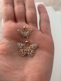 Give her the gift of wings with this beautiful butterfly necklace.DETAILS- 14k rose gold butterfly with rhodium plating - Both pendant and chain are 14k gold- Chain style may vary slightly- Approximately 1 inch wide x 3/4 inch tall (including bail) VARIATIONSIf you require any variation of this style (a different style chain, longer chain, etc.) feel free to email us at Customercare@kimiyadesigns.com. We will do our best to accommodate you. Additional costs may apply depending on the variation.P Gold Butterfly Necklace, Rose Gold Butterfly, Butterfly Necklace Gold, Small Rose, Gold Butterfly, Butterfly Necklace, Long Chain, Beautiful Butterflies, The Gift