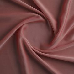 a close up view of a pink fabric