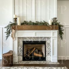 a fireplace decorated with greenery and candles