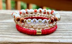 This stack is beautiful! I love the old fashion floral beads, and the red Heishi bracelet!  ♥️This stack consists of three bracelets.  * A floral porcelain and wood bead bracelet. I can add any name or word.  * A red Heishi bracelet with a gold spacer bead.  * A light brown glass bead bracelet with tiny gold spacer discs.  ♥️All gold beads are 14k non-tarnish beads. ♥️{Sizing}  The average size is 7. I can make these in any size! Please see the measurement directions in the item images to get your perfect fit!  ♥️{Personalization}  I can change the wording to any name or word. Please let me know what you want on your bracelet!  Thank you! Handmade Red Bracelets For Everyday, Red Personalized Spiritual Bracelets, Personalized Red Spiritual Bracelets, Personalized Spiritual Red Bracelets, Bohemian Letter Beads Bracelets For Mother's Day, Adjustable Red Stackable Stretch Bracelet, Handmade Bohemian Bracelets For Holiday, Bohemian Handmade Bracelets For Holiday, Bohemian White Bracelets For Mother's Day