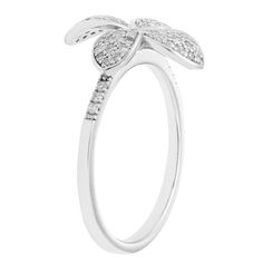 Accessorize with style when you wear this sparkling diamond sterling silver flower ring. Accessorize with style when you wear this sparkling diamond sterling silver flower ring.Click on this JEWELRY & WATCHES GUIDE to learn about fit, styles, materials and more! Nickel free Metal: sterling silver Packaging: boxed Plating: rhodium Width: 10 mm Finish: polishedDIAMOND DETAILS Total weight: 1/4 ct. Color grade: H Clarity: 11 Shape: round brilliant Setting: micro pave Diamond weights are approximate Diamond White Flower Ring Fine Jewelry, Flower Shaped Rings With Diamond Accents For Anniversary, Fine Jewelry Diamond White Flower Shaped Rings, White Gold Flower Shape Diamond Ring With Prong Setting, Flower Shaped Anniversary Rings With Diamond Accents, Anniversary Flower Shaped Rings With Diamond Accents, Anniversary Flower-shaped Rings With Diamond Accents, Diamond Flower Ring With Diamond Accents, Flower Shaped Promise Ring With Diamond Accents