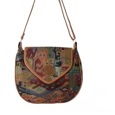 Vintage multicoloured crossbody or shoulder bag with a gorgeous abstract native pattern Ca late 1980s / early 1990s  Width: 30 cm // 11.8 '' Height: 25 cm // 9.8 '' Depth: up to 9 cm // up to 3.5 '' Strap drop: 28 - 55 cm // 11 - 21.6 '' (length of strap is adjustable) Double closure (magnet + zipper) Beautiful condition Materials: imitation-leather (not real), fine-woven multicoloured fabric   Shipping will be charged only once when ordering multiple items from my shop More vintage items in my Multicolor Crossbody Flap Bag For Travel, Multicolor Flap Bag With Adjustable Strap For Travel, Multicolor Crossbody Flap Bag For Everyday Use, Multicolor Flap Shoulder Bag With Adjustable Strap, Multicolor Flap Bag With Adjustable Strap For Everyday Use, Multicolor Saddle Shoulder Bag For Travel, Multicolor Shoulder Saddle Bag For Daily Use, Multicolor Satchel Saddle Bag For Travel, Multicolor Satchel Saddle Bag For Daily Use