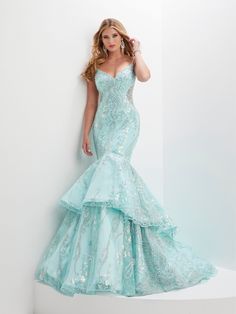 This stunning mermaid gown has a sweetheart neckline with spaghetti straps, a fitted body, and a full double-tiered mermaid skirt with a sweep train, all done in a beautiful pearl, bugle bead and sequin swirl design. Sequin Print Tiered Mermaid Dress by Panoply 14150 Panoply Collection by the House of Wu: Spring 2023 Fabric: Floral Sequins Please note: There may be a loss of sequins while wearing this dress due to the nature of the fabric Colors: Aqua, Royal Blue Sizes Available (as of 12/12/202 Aqua Green Dress, Mermaid Cut Dress, Corset Mermaid Wedding Dress, Aqua Prom Dress, Formal Dresses Mermaid, Hoco 2024, Fantastic Dress, Dream Prom Dress, Sea Dress