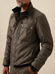 Moto imaginings flourish on this utilitarian style jacket inspired by earlier designs of the Royal Navy and reimagined in a super-sturdy recycled fabric.  Complete with a warm wool lining, quilted reinforcements to protect the shoulders and elbows, a Quilted Utility Jacket For Winter, Winter Utility Outerwear For Urban Adventures, Urban Style Quilted Jacket For Outdoor Fall Activities, Urban Quilted Jacket For Fall Outdoor, Urban Quilted Jacket For Outdoor Fall Season, Urban Quilted Jacket For Outdoor Fall Activities, Functional Quilted Jacket With Padded Collar For Fall, Rugged Winter Outerwear With Patch Pockets, Winter Biker Jacket With Flap Pockets