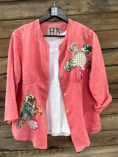 Bright salmon button down shirt, long sleeve size M Upcycled  patched embellished top, upcycled shirt ,patched flower shirt, ooak by HerdingBoho on Etsy Pink Patchwork Blouse For Spring, Casual Upcycled Tops For Spring, Bohemian Pink Shirt For Spring, Spring Cotton Tops With Patches, Spring Pink Shirt With Patchwork, Casual Pink Tops With Floral Patchwork, Fall Patchwork Pink Blouse, Cotton Long Sleeve Tops With Patches, Spring Bohemian Pink Shirt