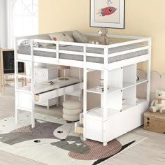 a white loft bed with desk underneath it in a child's bedroom or playroom