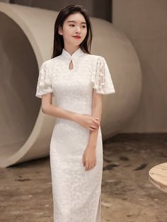 ⭐⭐ Free Shipment to Worldwide! Handmade Lace Gown Dress for Brides. ⭐⭐ This White Dress can be custom size according to your measurement. Please send us your Shoulder Width/ Bust/Waist/Hip/ Dress Length for size customization. And your height; Another Wine Red color option Link to: https://www.etsy.com/listing/1037914242/custom-size-able-china-red-wedding?ref=listings_manager_grid 1. This Cheongsam/ Qipao is made for occasions as : ⭐ Perfect for Brides who wants a Traditional wedding ceremony; 领 Elegant Lace Trim Wedding Dress, Elegant White Wedding Dress For Ceremony, Fitted Gown With Lace Sleeves For Banquet, Fitted Lace Dress With Lace Trim For Banquet, Fitted Lace Dress For Banquet, Elegant Dresses With Lace Sleeves For Wedding Night, Fitted Wedding Dress With Lace Trim, Elegant Wedding Night Dress With Lace Sleeves, Fitted Lace Gown With Short Sleeves