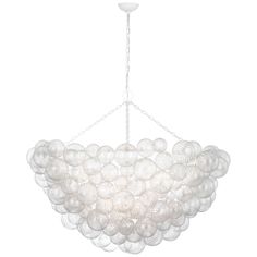 a white chandelier hanging from the ceiling