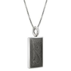 CBM-74 Solidified ashes set into this classically-shaped unisex .925 sterling silver rectangle pendant. It comes with a sterling silver chain in the length and thickness of your choice. Dimensions:24 x 13mm All dimensions are approximate and may vary slightly with every casting. This pendant can be engraved with up to 10 characters, including spaces and simple symbols, in a single line horizontally across its back; a maximum of 10 separate lines can be accommodated. When necessary or upon reques Silver Rectangular Necklace With Polished Finish, Rectangular Necklace With Polished Finish For Formal Occasions, Formal Rectangular Necklace With Polished Finish, Classic Square Pendant Necklace With Polished Finish, Minimalist Rectangular Necklace With Polished Finish, Rectangular White Gold Sterling Silver Necklace, White Gold Sterling Silver Rectangular Necklace, Silver Rectangular Jewelry With Engraving Option, Silver Necklaces With Engraved Rectangular Links