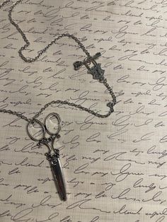 This adorable pair of scissors is the perfect addition to any wardrobe.  The pendant is hanging on an 18inch silver tone chain with a great little lock and key toggle. Key And Lock Necklace, Scissor Necklace, Key And Lock, Lock Necklace, Lock And Key, Frogs, Charm Necklace, Necklace Etsy, Vintage Inspired