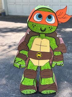 Pinata inspired by ninja turtles, measures 34"x22"x5" Ninja Turtle Theme Party Walmart, Ninja Turtle Birthday Centerpieces, Ninja Turtle 1st Birthday, Tmnt Party Decorations, Ninja Turtle Birthday Decorations, Ninja Turtle Pinata, Tmnt Birthday Party Ideas, Ninja Turtles Birthday Party Ideas, The Ninja Turtles