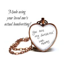 Elevate your jewelry game with our Custom Loved Ones Handwriting Necklace or Key Chain. keep your special someone close to your heart with a signature or personalized handwriting piece. Perfect for honoring the bond between a child and parent, or a loved one who has passed. Handcrafted with precision and care. Your loved ones own handwriting captured in a glass domed Heart Pendant.  Available in Antique Copper, Gunmetal or Bright Silver finish.  You can also choose to have this as necklace or key chain. A perfect way to capture the exact handwriting, drawing or doodle from your loved one!  This custom necklace (or key chain) can be for Mother's Day, Father's Day, Grandparent's, Weddings, Graduations or simply to carry your loved one's special message or signature with you wherever you go. Handwriting Drawing, Drawing Jewelry, Engraved Heart Necklace, Wedding Bouquet Charms, Personalized Memorial Gifts, Handwriting Necklace, Engagement Gifts For Her, Handwriting Jewelry, Picture Necklace