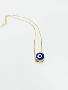 Dainty evil eye necklace is adjustable. This Turkish jewelry would be the great gift as a protection jewelry. Lenght of the nazar necklace is 45 cm (17.5 in) Blue Evil eye bead is 1 cm (0.3 in) For more evil eye necklaces, click the link below; https://www.etsy.com/shop/EyeDesignsbyGG?ref=search_shop_redirect&section_id=30285329 Blue Necklace With Adjustable Length For Gifts, Evil Eye Round Pendant Necklace Gift, Adjustable Round Evil Eye Necklace, Evil Eye Charm Necklace With Round Pendant As Gift, Evil Eye Charm Necklace With Round Pendant For Gifts, Adjustable Evil Eye Spiritual Necklace, Adjustable Spiritual Evil Eye Necklace, Minimalist Evil Eye Pendant Necklace, Minimalist Evil Eye Charm Necklace