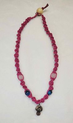 Handmade Usa Item * HEMP COLOR: pink *  Type: Necklace SPIRAL 18 inches long  * Materials: Smooth Blue Tiger Eye Stone, Natural Pink Quartz Stone, Black Veined Rhodonite Mushroom, Pink rope * Jewelry Style: Boho & hippie FAST SHIPPING  ✉️ 🇺🇸 Macramé hemp jewelry is a unique and stylish accessory that combines the art of macrame knotting with the natural beauty of hemp fibers. Handcrafted with care and attention to detail, each piece of macramé hemp jewelry is a work of art that adds a bohemian and earthy touch to any outfit. The use of hemp fibers in macramé jewelry not only adds a rustic and organic feel but also makes it an eco-friendly choice. Hemp is a sustainable and renewable material that requires minimal water and pesticides to grow, making it an environmentally conscious option Adjustable Pink Jewelry For Festivals, Handmade Spiritual Pink Beaded Necklaces, Handmade Pink Spiritual Beaded Necklace, Hippie Adjustable Cord Necklace For Festivals, Bohemian Festival Crystal Necklace With Adjustable Cord, Spiritual Adjustable Necklace For Festivals, Handmade Adjustable Necklaces For Meditation, Pink Spiritual Hand Wrapped Necklaces, Hand Wrapped Pink Spiritual Necklaces