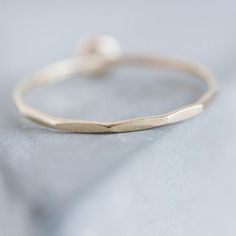 Tiny skinny stackable ring with beautiful Pink Opal. It is made with a skinny but sturdy band, perfect for everyday wear. It is a gentle and delicate piece, which you may wear alone or stacked. It is a great every-day jewel which will perfectly suit any occasion and any outfit. The ring is 0,8-0,9 mm thick and looks very dainty on the finger. Choose the size of the stone (3 or 5 mm) and material for the ring (sterling silver or 9k gold). If you want to change the ring band design or get a custom Pink Opal Ring, Gold Rings Stackable, Hammered Ring, Silver Stacking Rings, Lower Case, Price Quote, Initial Ring, Ruby Stone, Stackable Ring