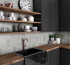 a black kitchen sink sitting under a clock on top of a wooden shelf next to a counter