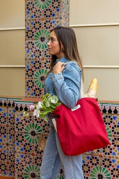 A simple and elegant vegan tote bag made with canvas fabric and cotton handles. Easy to wash :) A casual everyday fabric tote bag with a warm and beautiful dark red color.  Perfect size for carrying your books on your library day and as a shopping bag to wear in your purse. The design of the bag is simple, elegant, and minimal. It will look good with any of your looks and styles. This bag is made of cotton, both the fabric and the handles. The handles are long enough to put the bag as a backpack Red Cotton Canvas Shopping Bag, Red Cotton Canvas Bag For Shopping, Red Casual Cotton Shoulder Bag, Casual Red Cotton Shoulder Bag, Red Eco-friendly Canvas Shopping Bag, Eco-friendly Red Canvas Bag For Daily Use, Red Cotton Shoulder Bag For Daily Use, Eco-friendly Red Cotton Canvas Bag, Eco-friendly Red Cotton Bag