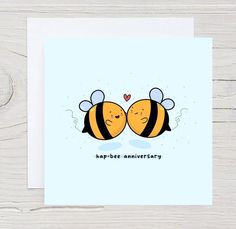 a card with two bees hugging each other