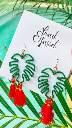 You need to palm down! These Palm Leaf Hot Pink Tassel Earrings are PALMTASTIC! Don't forget to pack these on your next beach vacay! Plus, they're lightweight and comfortable to wear, so you can enjoy a day in the sun without weighing your ears down. Adjustable Tassel Earrings For Summer Gift, Adjustable Summer Jewelry With Tassels, Beachy Green Jewelry For Vacation, Green Beachy Jewelry For Vacation, Tropical Style Summer Beach Jewelry, Tropical Style Summer Vacation Jewelry, Adjustable Beachy Earrings For Vacation, Beachy Green Jewelry For Beach Season, Summer Tassel Earrings Gift